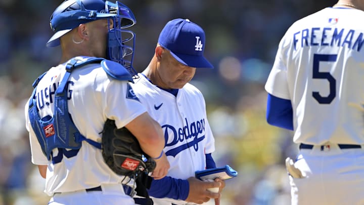 Los Angeles Dodgers catcher Dalton Rushing (68) waits with manager Dave Roberts (30) on the mound during a pitching change in the eighth inning against the Houston Astros at Dodger Stadium on July 6. Los Angeles Dodgers catcher Dalton Rushing (68) waits with manager Dave Roberts (30) on the mound during a pitching change in the eighth inning against the Houston Astros at Dodger Stadium on July 6.