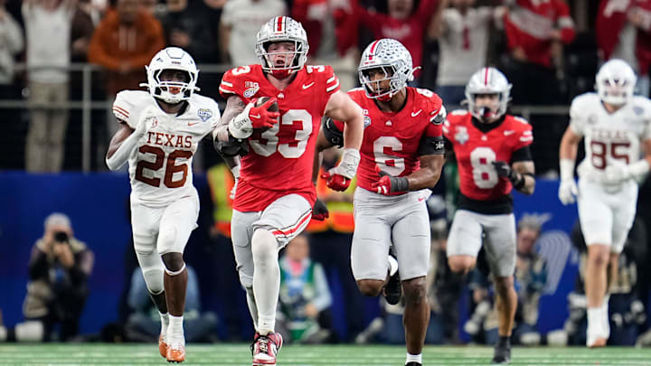 Ohio State defensive end Jack Sawyer returns a fumble recovery for a touchdown against Texas during the Cotton Bowl.