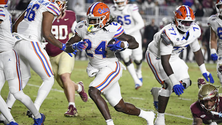 Nov 30, 2024; Tallahassee, Florida, USA; Florida Gators running back Ja'Kobi Jackson (24) rushes the ball during the first half against the Florida State Seminoles at Doak S. Campbell Stadium. Mandatory Credit: Melina Myers-Imagn Images Nov 30, 2024; Tallahassee, Florida, USA; Florida Gators running back Ja'Kobi Jackson (24) rushes the ball during the first half against the Florida State Seminoles at Doak S. Campbell Stadium. Mandatory Credit: Melina Myers-Imagn Images