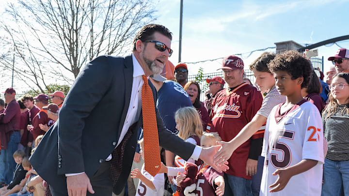 Nov 9, 2024; Blacksburg, Virginia, USA; Virginia Tech Hokies head coach Brent Pry greets fans before the game against the Clemson Tigers as he enters Lane Stadium. Mandatory Credit: Brian Bishop-Imagn Images Nov 9, 2024; Blacksburg, Virginia, USA; Virginia Tech Hokies head coach Brent Pry greets fans before the game against the Clemson Tigers as he enters Lane Stadium. Mandatory Credit: Brian Bishop-Imagn Images