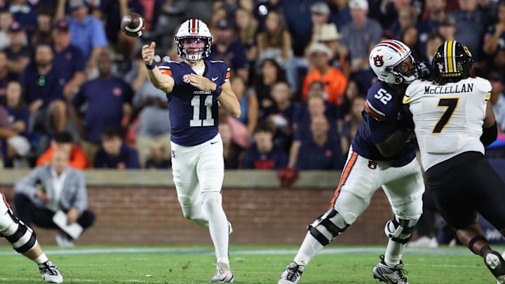 Oct 18, 2025; Auburn, Alabama, USA; Auburn Tigers quarterback Jackson Arnold (11) throws a pass during the first quarter against the Missouri Tigers at Jordan-Hare Stadium. Mandatory Credit: John Reed-Imagn Images