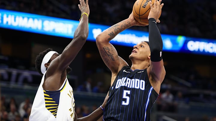 Oct 28, 2024; Orlando, Florida, USA; Orlando Magic forward Paolo Banchero (5) shoots the ball over Indiana Pacers forward Pascal Siakam (43) in the first quarter at Kia Center. Mandatory Credit: Nathan Ray Seebeck-Imagn Images