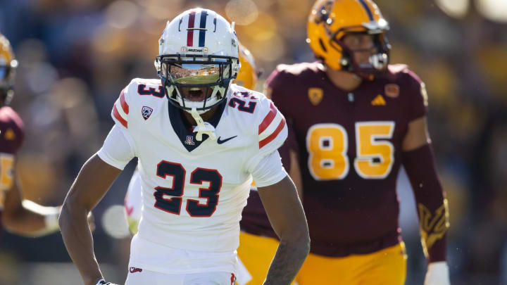 Nov 25, 2023; Tempe, Arizona, USA; Arizona Wildcats cornerback Tacario Davis (23) celebrates a play against the Arizona State Sun Devils in the first half of the Territorial Cup at Mountain America Stadium. Nov 25, 2023; Tempe, Arizona, USA; Arizona Wildcats cornerback Tacario Davis (23) celebrates a play against the Arizona State Sun Devils in the first half of the Territorial Cup at Mountain America Stadium.