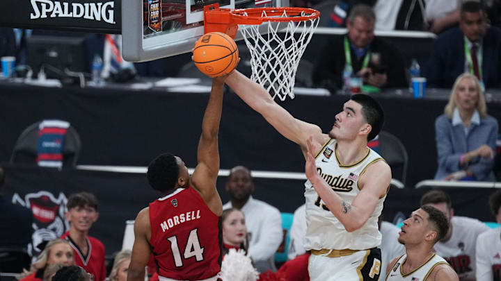 Apr 6, 2024; Glendale, AZ, USA; Purdue Boilermakers center Zach Edey (15) blocks a shot by North