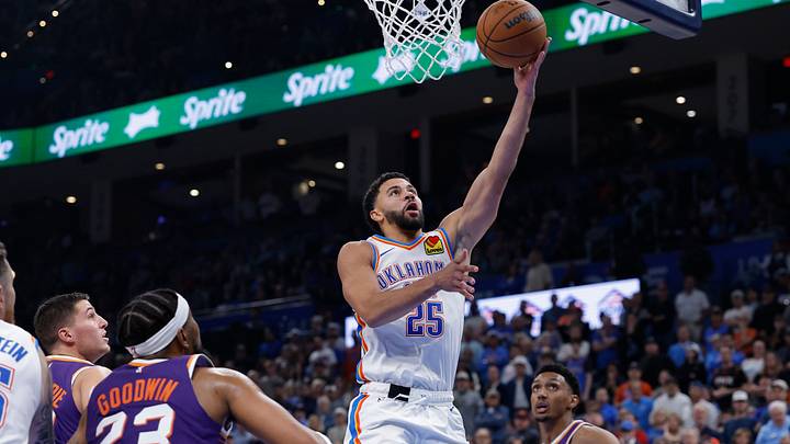 Oct 26, 2026; Oklahoma City, Oklahoma, USA; Oklahoma City Thunder guard Ajay Mitchell (25) goes to the basket against the Phoenix Suns during the second half at Paycom Center. Mandatory Credit: Alonzo Adams-Imagn Images