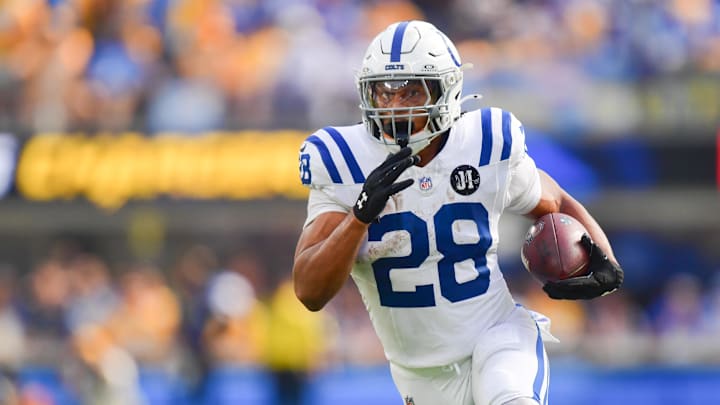 Indianapolis Colts running back Jonathan Taylor (28) moves the ball in the first half against the Los Angeles Chargers at SoFi Stadium. Indianapolis Colts running back Jonathan Taylor (28) moves the ball in the first half against the Los Angeles Chargers at SoFi Stadium.
