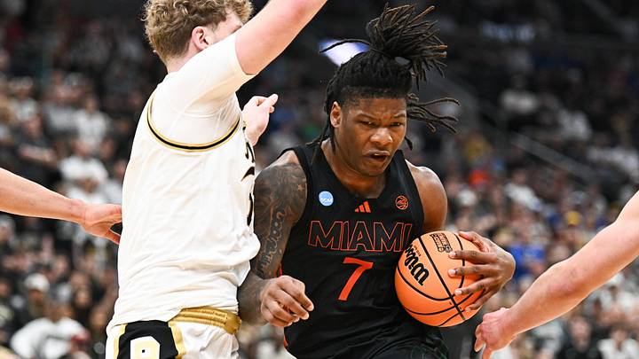 Mar 22, 2026; St. Louis, MO, USA; Miami Hurricanes forward Shelton Henderson (7) drives to the basket as Purdue Boilermakers guard Jack Benter (14) defends during the second half during a second round game of the men's 2026 NCAA Tournament at Enterprise Center. Mandatory Credit: Jeff Le-Imagn Images Mar 22, 2026; St. Louis, MO, USA; Miami Hurricanes forward Shelton Henderson (7) drives to the basket as Purdue Boilermakers guard Jack Benter (14) defends during the second half during a second round game of the men's 2026 NCAA Tournament at Enterprise Center. Mandatory Credit: Jeff Le-Imagn Images