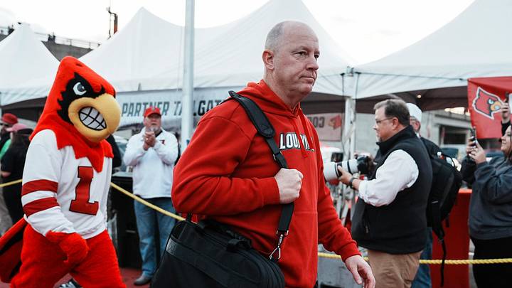 Louisville football coach Jeff Brohm leads the team as the Cards head to the locker room at the Cards March before the Louisville football game against Clemson at L&N Stadium Friday. Nov. 14, 2025 Louisville football coach Jeff Brohm leads the team as the Cards head to the locker room at the Cards March before the Louisville football game against Clemson at L&N Stadium Friday. Nov. 14, 2025