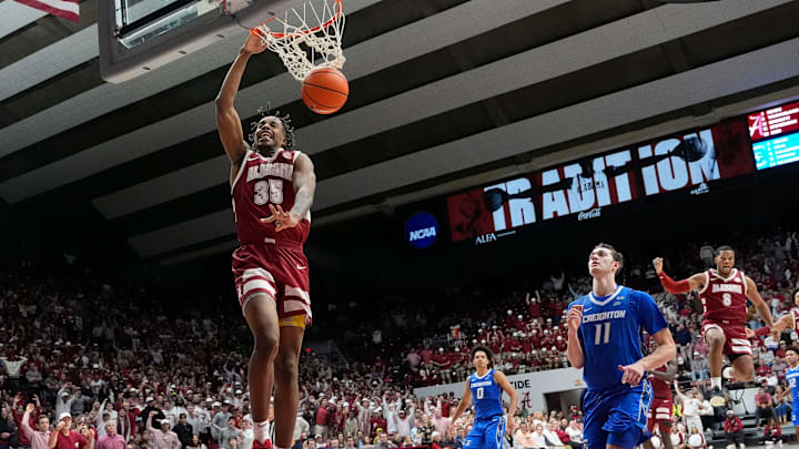 Dec 14, 2024; Tuscaloosa, AL, USA; Alabama forward Derrion Reid (35) gets a breakaway dunk with Creighton center Ryan Kalkbrenner (11) too far behind to defend the dunk at Coleman Coliseum. Alabama defeated Creighton 83-75. Mandatory Credit: Gary Cosby Jr.-Tuscaloosa News Dec 14, 2024; Tuscaloosa, AL, USA; Alabama forward Derrion Reid (35) gets a breakaway dunk with Creighton center Ryan Kalkbrenner (11) too far behind to defend the dunk at Coleman Coliseum. Alabama defeated Creighton 83-75. Mandatory Credit: Gary Cosby Jr.-Tuscaloosa News