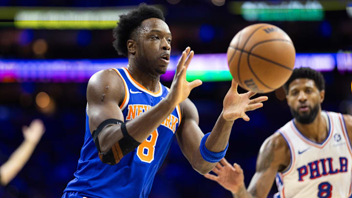 Jan 15, 2025; Philadelphia, Pennsylvania, USA; New York Knicks forward OG Anunoby (8) catches a pass in front of Philadelphia 76ers forward Paul George (8) during the first quarter at Wells Fargo Center. Mandatory Credit: Bill Streicher-Imagn Images Jan 15, 2025; Philadelphia, Pennsylvania, USA; New York Knicks forward OG Anunoby (8) catches a pass in front of Philadelphia 76ers forward Paul George (8) during the first quarter at Wells Fargo Center. Mandatory Credit: Bill Streicher-Imagn Images