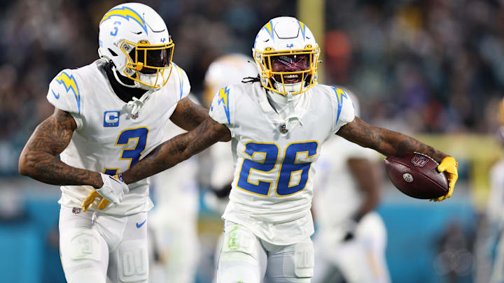Los Angeles Chargers cornerback Asante Samuel Jr. celebrates with safety Derwin James Jr. after an interception.