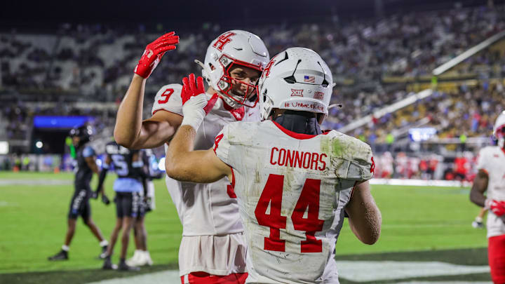 Nov 7, 2025; Orlando, Florida, USA; Houston Cougars running back Dean Connors (44) celebrates after scoring during the second half against the UCF Knights at Acrisure Bounce House. Mandatory Credit: Mike Watters-Imagn Images
