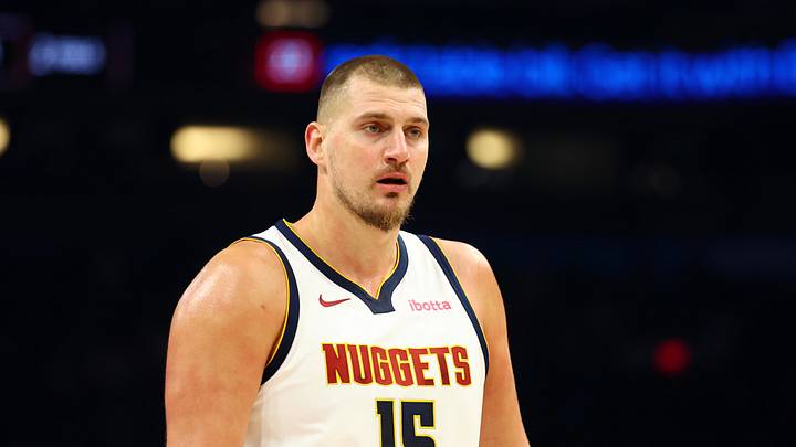 Nov 29, 2025; Phoenix, Arizona, USA; Denver Nuggets center Nikola Jokic (15) against the Phoenix Suns at the Mortgage Matchup Center.