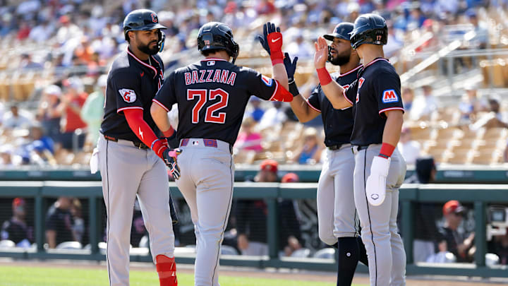 Feb 24, 2026: Cleveland Guardians second baseman Travis Bazzana (72) celebrates with teammates after hitting a three run home run against the Los Angeles Dodgers during a spring training game at Camelback Ranch-Glendale. 