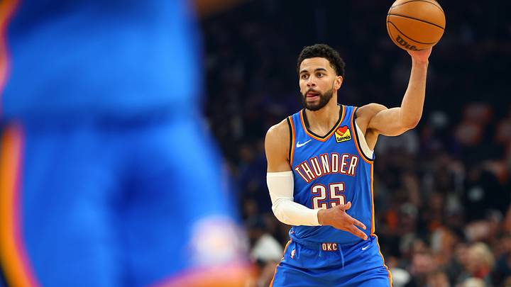 Apr 27, 2026; Phoenix, Arizona, USA; Oklahoma City Thunder guard Ajay Mitchell (25) against the Phoenix Suns during game four of the first round of the 2026 NBA Playoffs at Mortgage Matchup Center. Mandatory Credit: Mark J. Rebilas-Imagn Images