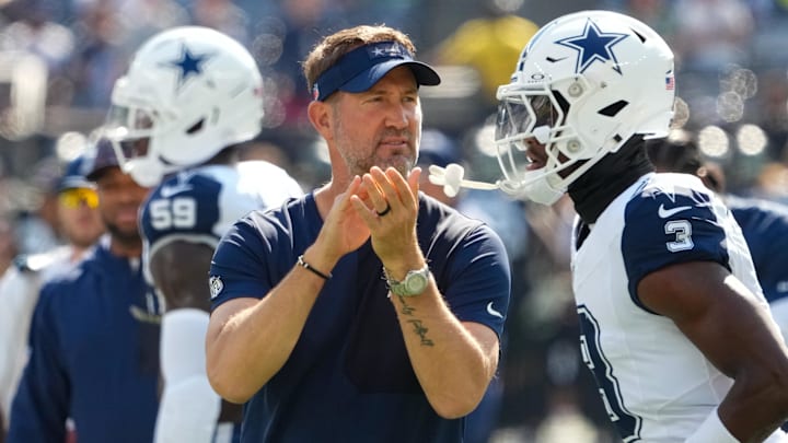 Dallas Cowboys head coach Brian Schottenheimer on the field during warm ups prior to a game against the New York Jets