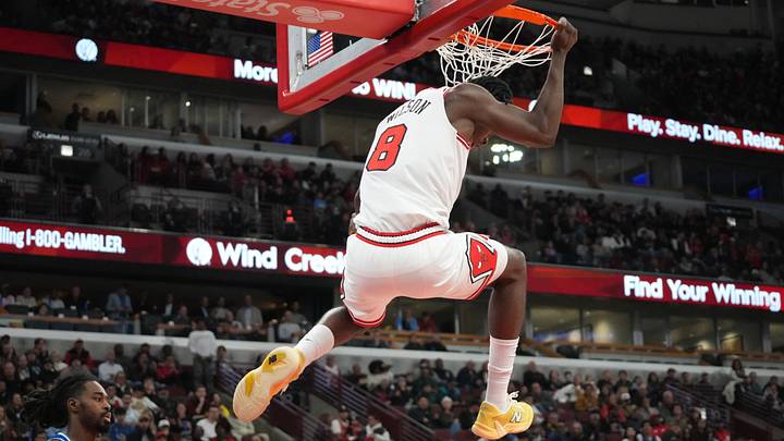 Oct 16, 2026; Chicago, Illinois, USA;  Chicago Bulls forward Caleb Wilson (8) dunks the ball against the Minnesota Timberwolves during the first half at United Center.  Mandatory Credit: David Banks-Imagn Images