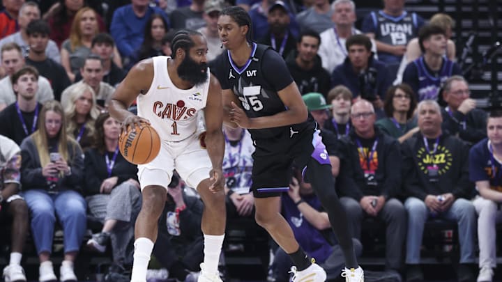 Mar 30, 2026; Salt Lake City, Utah, USA; Cleveland Cavaliers guard James Harden (1) posts up against Utah Jazz forward Cody Williams (5) during the first half at Delta Center. Mandatory Credit: Rob Gray-Imagn Images