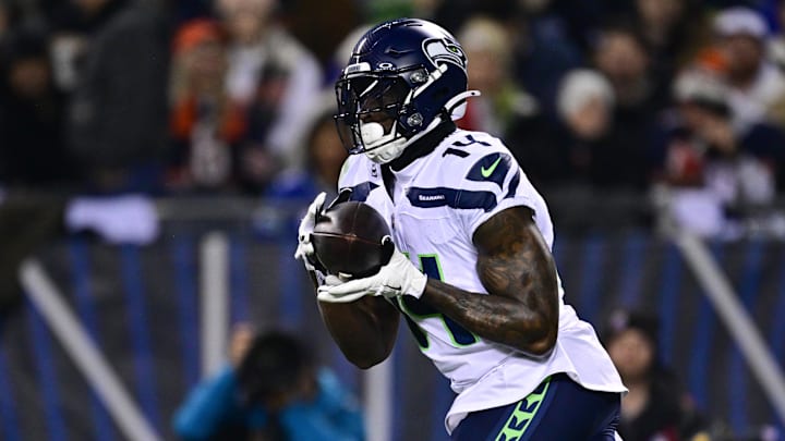 Dec 26, 2024; Chicago, Illinois, USA; Seattle Seahawks wide receiver DK Metcalf (14) makes a catch against the Chicago Bears during the first quarter at Soldier Field. Mandatory Credit: Daniel Bartel-Imagn Images