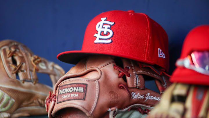 Sep 5, 2023; Atlanta, Georgia, USA; A detailed view of the hat and glove of St. Louis Cardinals second baseman Nolan Gorman (not pictured) before a game against the Atlanta Braves at Truist Park. Mandatory Credit: Brett Davis-Imagn Images Sep 5, 2023; Atlanta, Georgia, USA; A detailed view of the hat and glove of St. Louis Cardinals second baseman Nolan Gorman (not pictured) before a game against the Atlanta Braves at Truist Park. Mandatory Credit: Brett Davis-Imagn Images