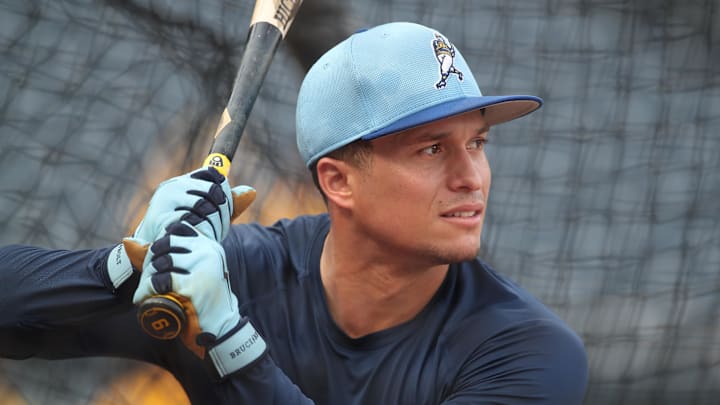 Sep 5, 2025; Pittsburgh, Pennsylvania, USA;  Milwaukee Brewers left fielder Isaac Collins (6) in the batting cage before the game against the Pittsburgh Pirates at PNC Park. Mandatory Credit: Charles LeClaire-Imagn Images