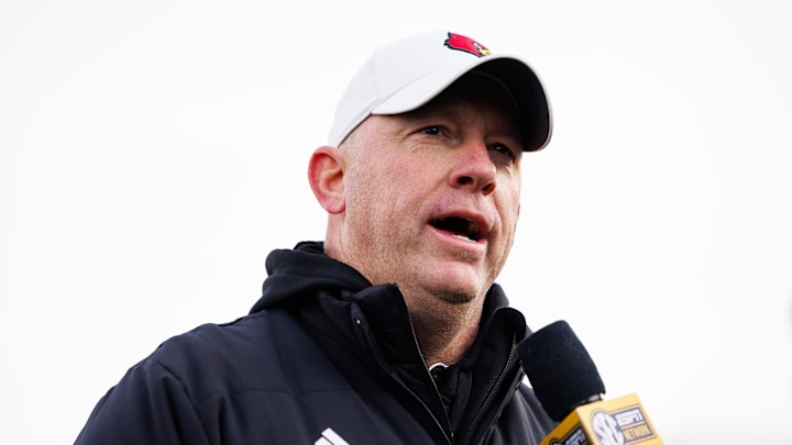 Nov 30, 2024; Lexington, Kentucky, USA; Louisville Cardinals head coach Jeff Brohm is interviewed after the game against the Kentucky Wildcats at Kroger Field. 