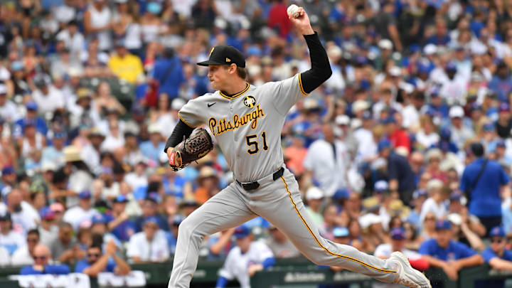 Aug 16, 2025; Chicago, Illinois, USA; Pittsburgh Pirates pitcher Evan Sisk (51) pitches during a game against the Chicago Cubs at Wrigley Field. Mandatory Credit: Patrick Gorski-Imagn Images