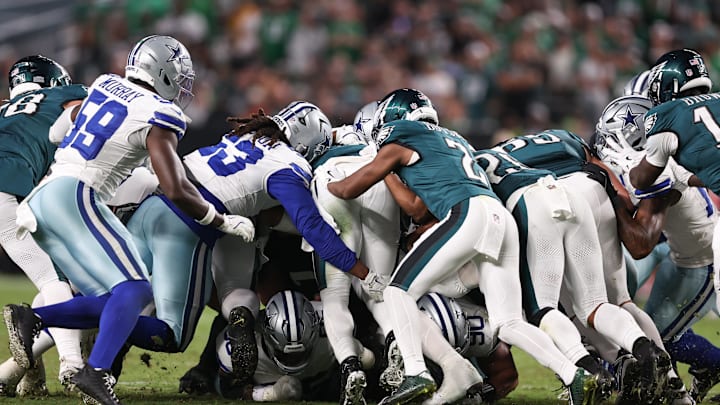 The Philadelphia Eagles execute a Tush Push for a first down against the Dallas Cowboys 