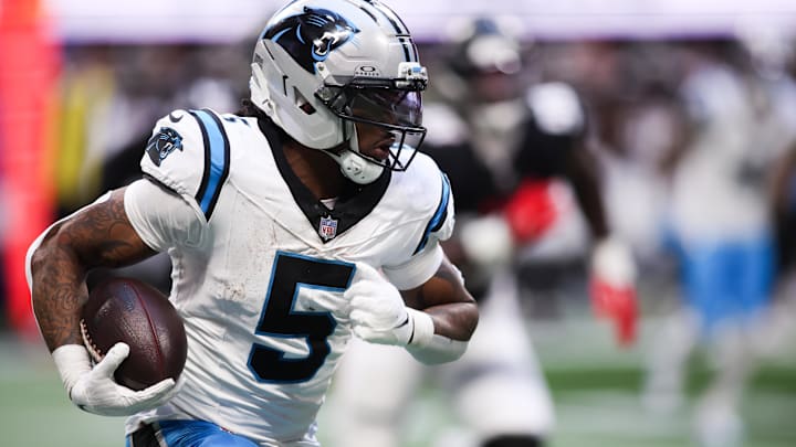 Nov 16, 2025; Atlanta, Georgia, USA; Carolina Panthers running back Rico Dowdle (5) runs with the ball in the third quarter against the Carolina Panthers at Mercedes-Benz Stadium. Nov 16, 2025; Atlanta, Georgia, USA; Carolina Panthers running back Rico Dowdle (5) runs with the ball in the third quarter against the Carolina Panthers at Mercedes-Benz Stadium.