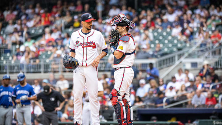 Sep 29, 2024; Cumberland, Georgia, USA; Atlanta Braves pitcher Charlie Morton (50) and catcher Sean Murphy (12) talk on the mound in the game against the Kansas City Royals during the first inning at Truist Park. Sep 29, 2024; Cumberland, Georgia, USA; Atlanta Braves pitcher Charlie Morton (50) and catcher Sean Murphy (12) talk on the mound in the game against the Kansas City Royals during the first inning at Truist Park.