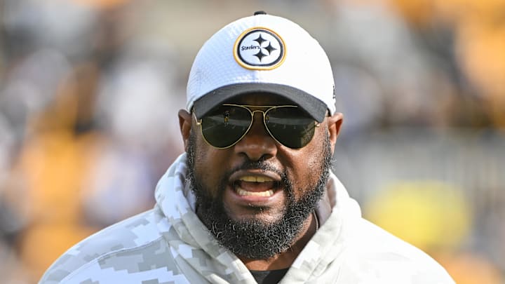 Pittsburgh Steelers coach Mike Tomlin stands on the sidelines.