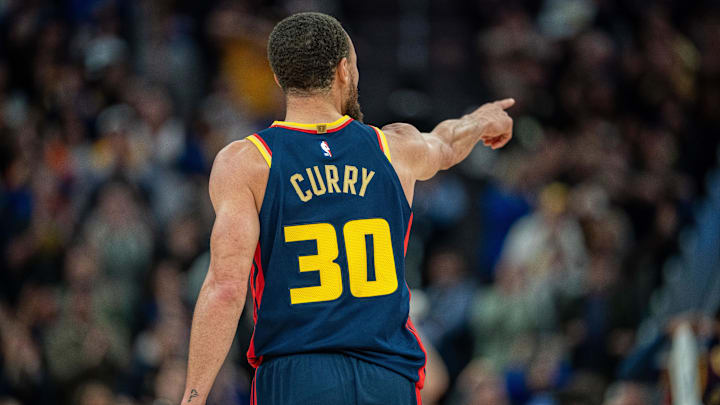 Mar 15, 2025; San Francisco, California, USA; Golden State Warriors guard Stephen Curry (30) celebrates after the basket against the New York Knicks during the fourth quarter at Chase Center. Mandatory Credit: Neville E. Guard-Imagn Images