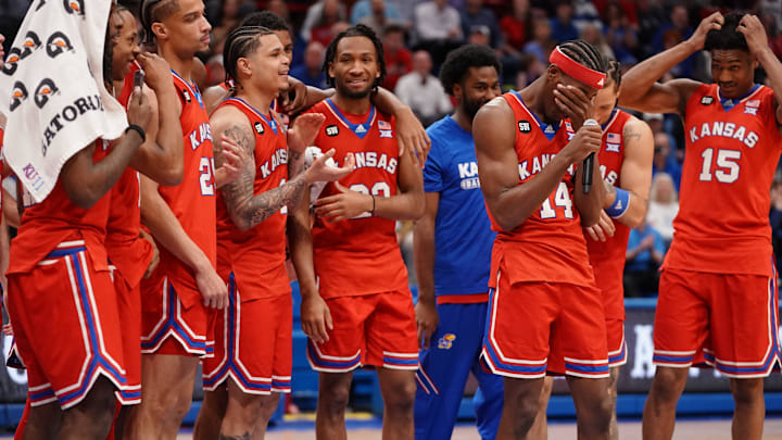 Kansas Jayhawks guard Melvin Council Jr. (14) tears up speaking following the Sunflower Showdown game inside Allen Fieldhouse in Lawrence, Kansas, on Saturday, March 7, 2026.