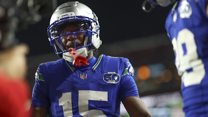 Seattle Seahawks wide receiver Tory Horton (15) between plays- against the Washington Commanders during the first quarter at Northwest Stadium. Mandatory Credit: Geoff Burke-Imagn Images