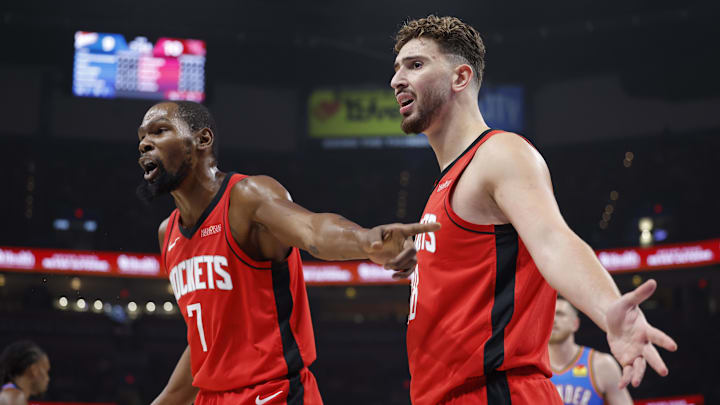 Oct 21, 2025; Oklahoma City, Oklahoma, USA; Houston Rockets forward Kevin Durant (7) and center Alperen Sengun (28) react after a play against the Oklahoma City Thunder during the first half at Paycom Center. Mandatory Credit: Alonzo Adams-Imagn Images