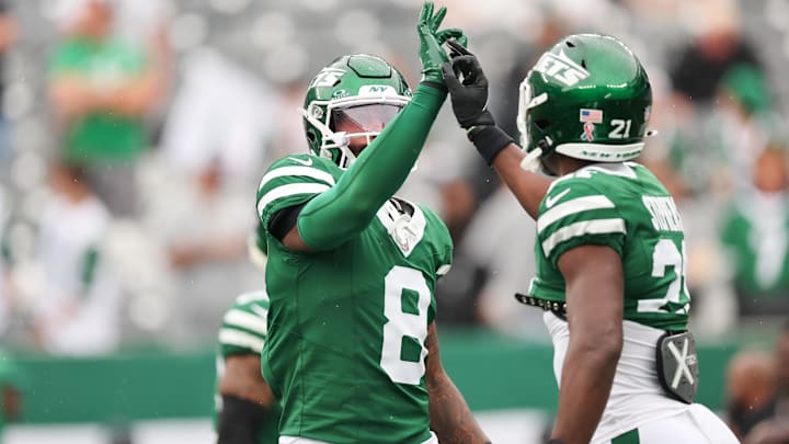 Sep 7, 2025; East Rutherford, New Jersey, USA; New York Jets safety Andre Cisco (8) and New York Jets cornerback Brandon Stephens (21) warm up before the game against the Pittsburgh Steelers at MetLife Stadium. Mandatory Credit: Vincent Carchietta-Imagn Images