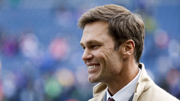 Oct 27, 2024; Seattle, Washington, USA; FOX commentator Tom Brady stands on the sideline before a game between the Seattle Seahawks and Buffalo Bills at Lumen Field. Mandatory Credit: Joe Nicholson-Imagn Images