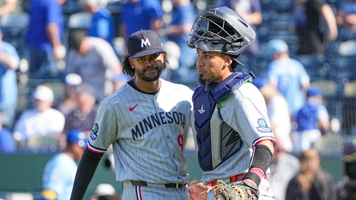 Sep 7, 2025; Kansas City, Missouri, USA; Minnesota Twins relief pitcher Genesis Cabrera (92) celebrates with catcher Jhonny Pereda (65) after the win over the Kansas City Royals at Kauffman Stadium. Mandatory Credit: Denny Medley-Imagn Images