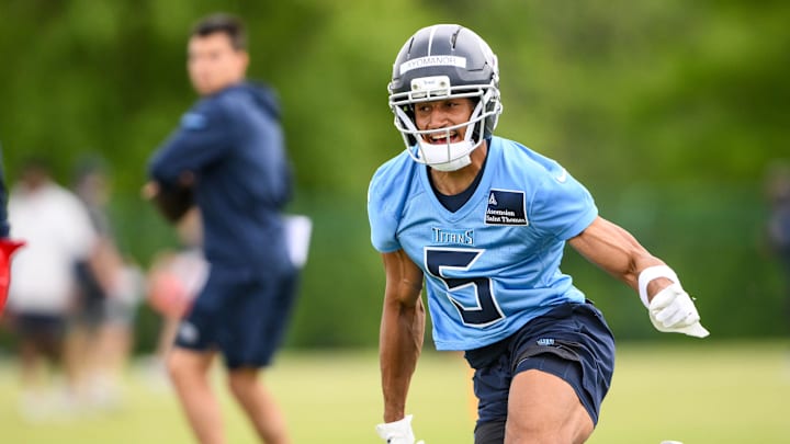 May 10, 2025; Nashville, TN, USA;  Tennessee Titans wider receiver Elic Ayomanor (5) goes through drills during Rookie Mini Camp at Saint Thomas Sports Park. Mandatory Credit: Steve Roberts-Imagn Images
