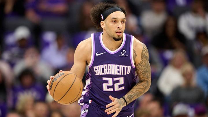 Apr 10, 2026; Sacramento, California, USA; Sacramento Kings guard Devin Carter (22) brings the ball upcourt against the Golden State Warriors during the first quarter at Golden 1 Center. Apr 10, 2026; Sacramento, California, USA; Sacramento Kings guard Devin Carter (22) brings the ball upcourt against the Golden State Warriors during the first quarter at Golden 1 Center.