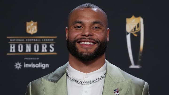 Dallas Cowboys quarterback Dak Prescott poses for a photo on the red carpet before the NFL Honors award show at Symphony Hall. 
