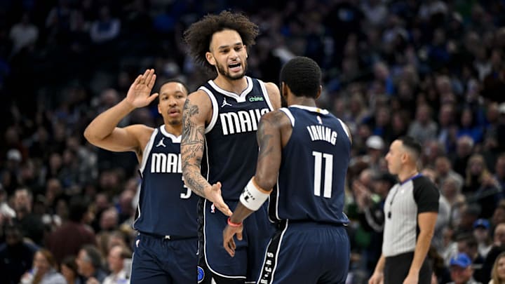 Jan 3, 2024; Dallas, Texas, USA; Dallas Mavericks guard Kyrie Irving and center Dereck Lively