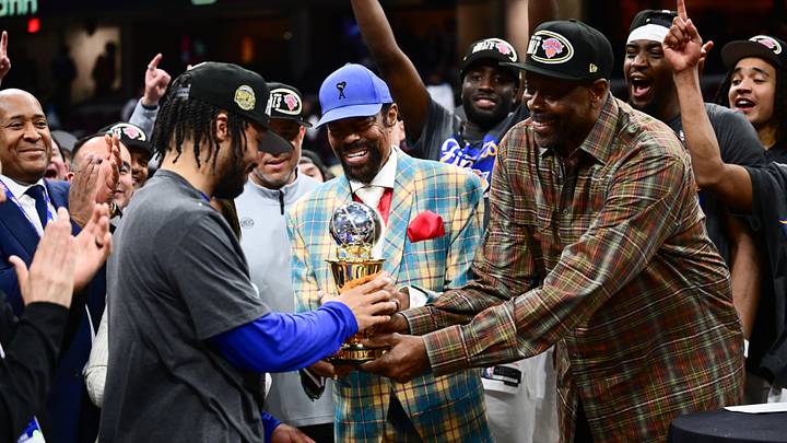 May 25, 2026; Cleveland, Ohio, USA; New York Knicks ambassador Patrick Ewing, center, and Hall of Fame basketball player Walt Frazier, right, presents New York Knicks guard Jalen Brunson (11), left, with the 2026 Eastern Conference MVP trophy after defeating the Cleveland Cavaliers in game four of the eastern conference finals for the 2026 NBA playoffs at Rocket Arena. Mandatory Credit: Ken Blaze-Imagn Images May 25, 2026; Cleveland, Ohio, USA; New York Knicks ambassador Patrick Ewing, center, and Hall of Fame basketball player Walt Frazier, right, presents New York Knicks guard Jalen Brunson (11), left, with the 2026 Eastern Conference MVP trophy after defeating the Cleveland Cavaliers in game four of the eastern conference finals for the 2026 NBA playoffs at Rocket Arena. Mandatory Credit: Ken Blaze-Imagn Images