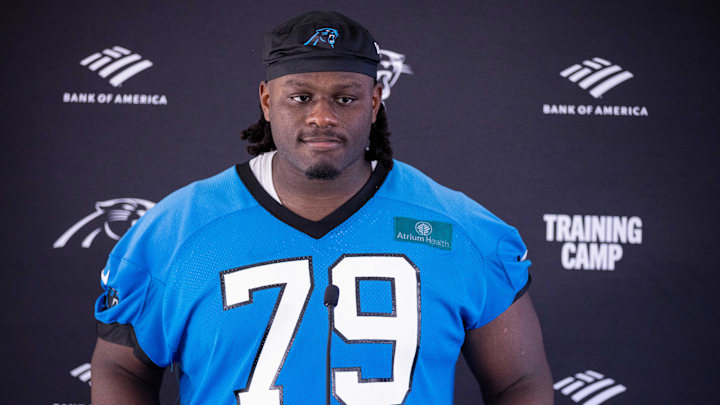 Carolina Panthers offensive tackle Ikem Ekwonu (79) talks with the media