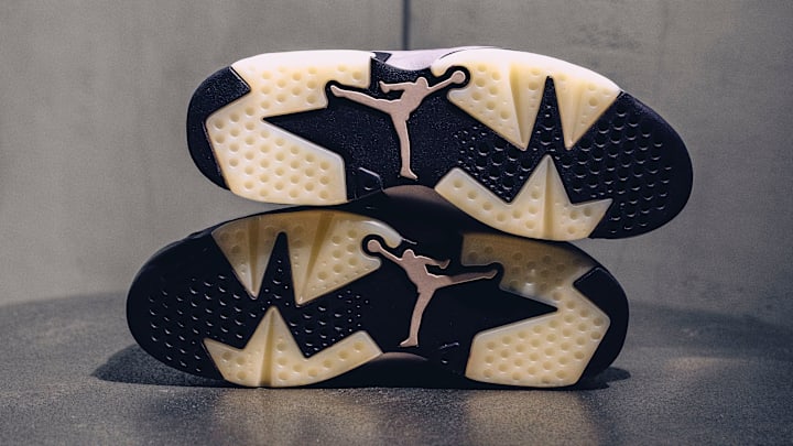 Outsoles of the A Ma Maniére x Air Jordan 6 "Smoky Mauve" colorway.