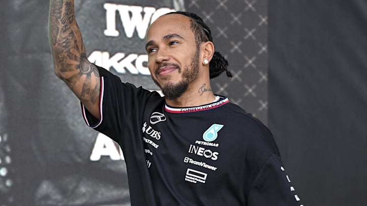 Oct 19, 2024; Austin, Texas, USA; Mercedes AMG Petronas F1 Team driver Lewis Hamilton (44) of Team Great Britain waves to the crowd during a fan forum before the Sprint Race in the 2024 Formula One US Grand Prix at Circuit of the Americas. Mandatory Credit: Jerome Miron-Imagn Images