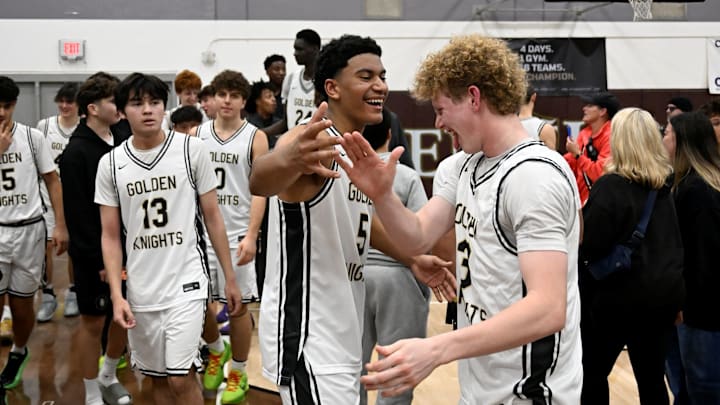 St. Francis players celebrate after beating Long Beach Poly in the Holiday Hoopfest final on Tuesday, Dec. 30, 2025