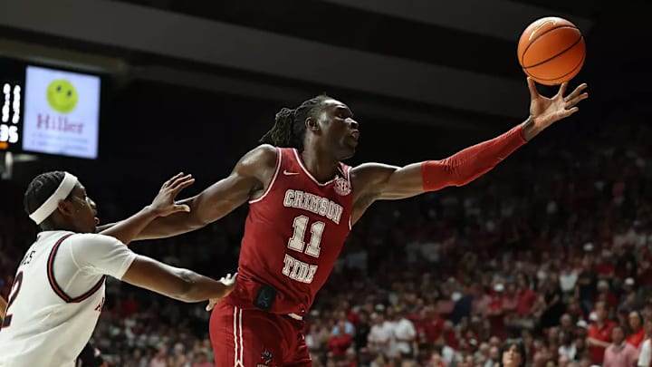 Alabama center Clifford Omoruyi (11) reaches for the ball against Auburn at Coleman Coliseum in Tuscaloosa, AL on Saturday, Feb 15, 2025. Alabama center Clifford Omoruyi (11) reaches for the ball against Auburn at Coleman Coliseum in Tuscaloosa, AL on Saturday, Feb 15, 2025.