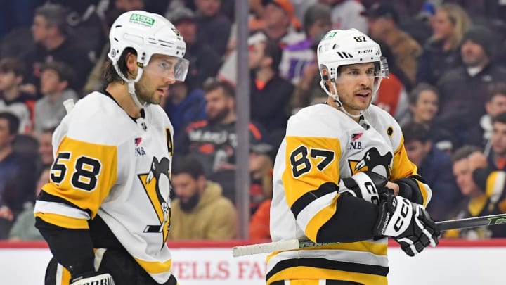 Pittsburgh Penguins defenseman Kris Letang (58) and center Sidney Crosby (87) against the Philadelphia Flyers at Wells Fargo Center.