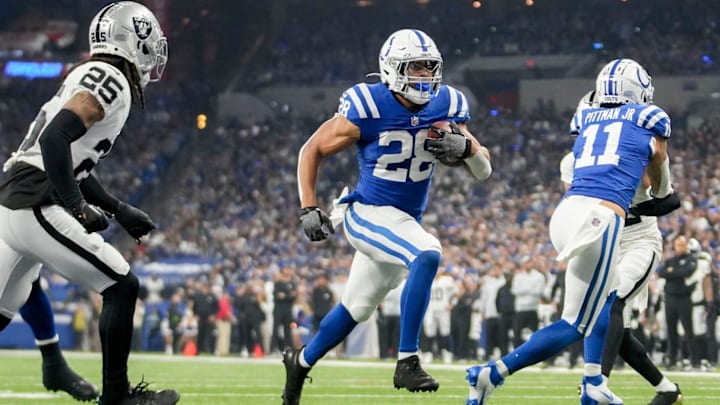 Indianapolis Colts running back Jonathan Taylor (28) rushes for a touchdown Sunday, Dec. 31, 2023, during a game against the Las Vegas Raiders at Lucas Oil Stadium in Indianapolis. Indianapolis Colts running back Jonathan Taylor (28) rushes for a touchdown Sunday, Dec. 31, 2023, during a game against the Las Vegas Raiders at Lucas Oil Stadium in Indianapolis.
